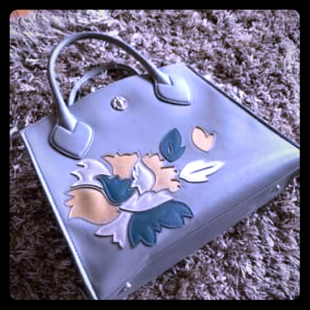 Beautiful gray purse.